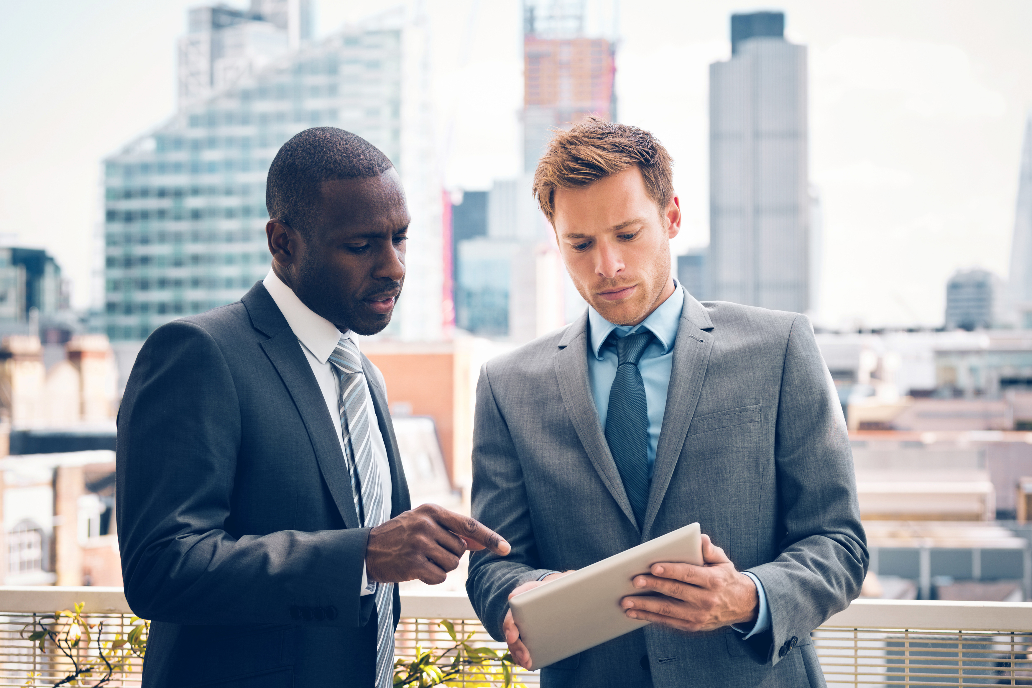 Two people consulting 