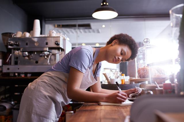 homepage banner - woman taking an order